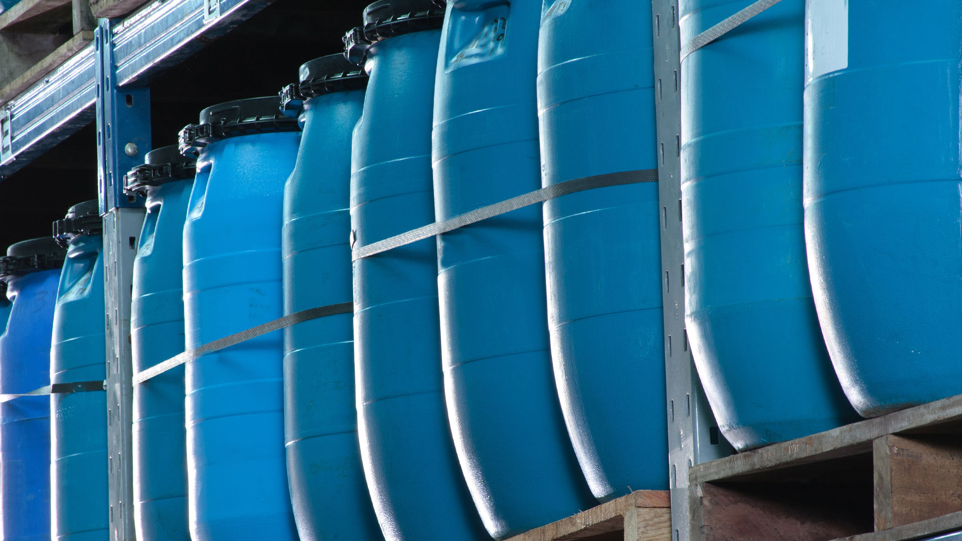 blue plastic storage drums